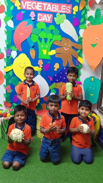 Children in colorful celebration costumes