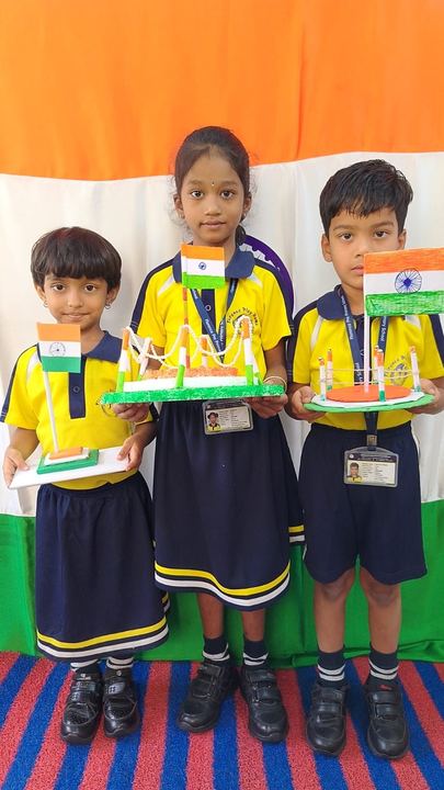 Children holding their classroom creations