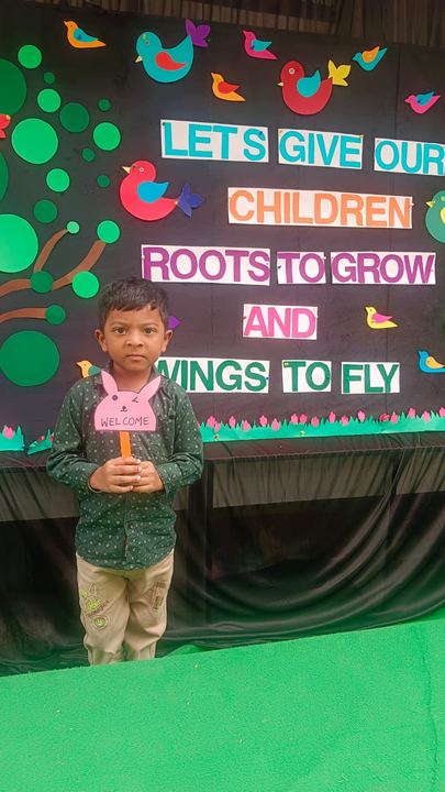 A child with a handmade school display
