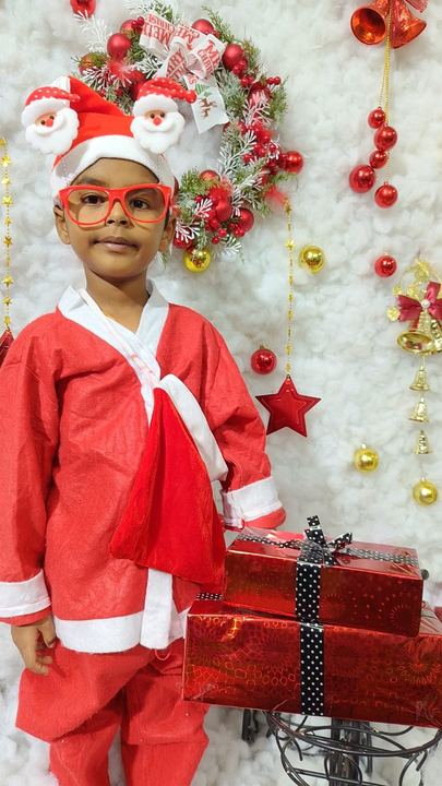 A child dressed for Christmas
